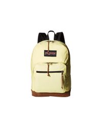 light yellow jansport backpack