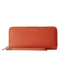 MICHAEL Michael Kors Orange Jet Set Travel Travel Continental