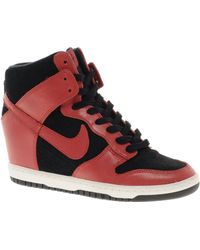 nike wedge heel trainers