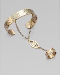 cuff bracelet with ring attached