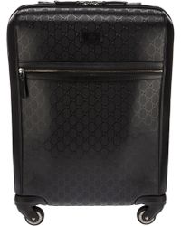 black gucci suitcase
