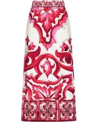 Dolce & Gabbana - Jupe mi-longue fendue en charmeuse à imprimé majoliques - Lyst