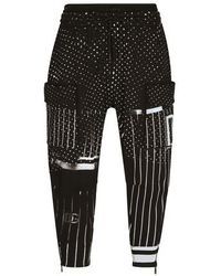 Dolce & Gabbana Pantalon cargo en jersey technique imprimé - Noir
