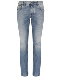 Dolce & Gabbana - Skinny Stretch Jeans With Rips - Lyst