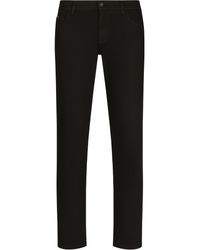 Dolce & Gabbana - Jean skinny en tissu élastique noir - Lyst