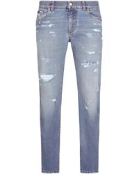 Dolce & Gabbana - Stretch-Jeans Slim Fit mit Rissen - Lyst