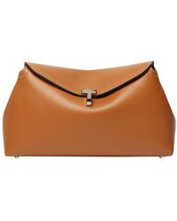 Totême - T-Lock Leather Clutch Bag - Lyst