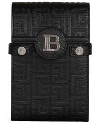 Balmain - Sac pochette B-Buzz smartphone en toile monogramme et cuir - Lyst