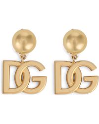 Dolce & Gabbana - Boucles d'oreilles avec logo DG - Lyst