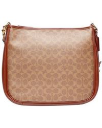 COACH Signature Canvas Cary Shoulder Bag in Brown | Lyst