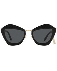 Lunettes de soleil Miu Miu pour femme | Réductions en ligne jusqu'à 50 % |  Lyst