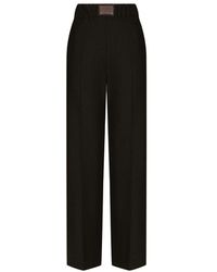 Dolce & Gabbana - Flared Wool Pants With Logo Tag - Lyst