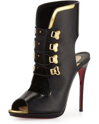 gold and black red bottoms