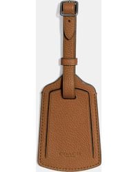 coach leather luggage