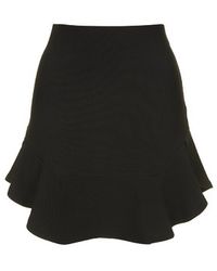 black flippy hem skirt