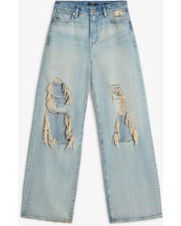 7 For All Mankind - Low Slung Wide Leg Mankind Peaches - Lyst