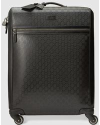 gucci carry on luggage with wheels