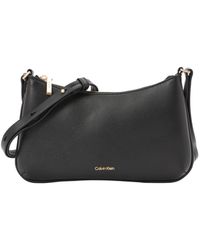 Calvin Klein - Umhängetasche Metal Logo - Lyst