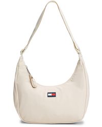 Tommy Hilfiger - Halbmondförmige Crossbody-Tasche - Lyst