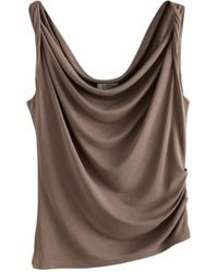 Next - Top - Lyst