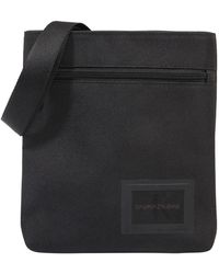 Calvin Klein Tasche 'ESSENTIALS MICROFLATPK' - Schwarz
