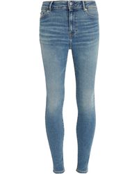 Tommy Hilfiger - Fit-Jeans TH FLEX HARLEM U SKINNY HW KAI in blauer Waschung - Lyst