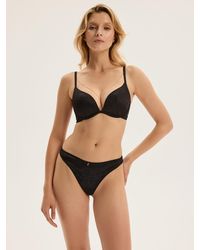 ESOTIQ - String Charm - Lyst