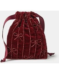 Accessorize - Embellished Bow Velvet Drawstring Bag - Lyst