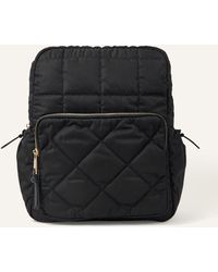 Accessorize - Women's Black Quilted Nylon Laptop Backpack - Lyst