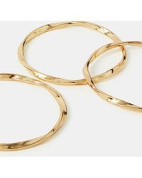 Accessorize - 3-Pack Slim Twist Bangles - Lyst