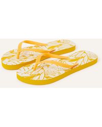 Accessorize - Women's Yellow Classic Tropical Leaf Print Flip Flops - Lyst