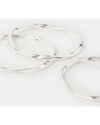 Accessorize - 3-Pack Slim Twist Bangles - Lyst