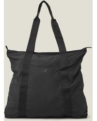 Accessorize - Women's Black Nylon Packable Travel Tote Bag - Lyst
