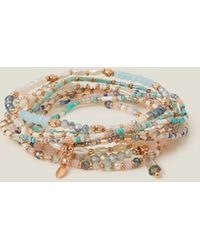 Accessorize - Women's Blue And Gold Beaded Stretch Bracelets - Lyst