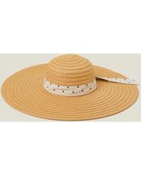 Accessorize - Polka Dot Bow Floppy Straw Hat - Lyst