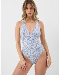 Accessorize - Sleeveless Crossback Floral Print Cross-Back Plunge Swimsuit - Lyst