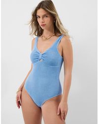 Accessorize - Sleeveless Low Back Seersucker Knot Front Crinkle Textured Swimsuit - Lyst