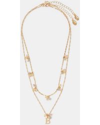 Accessorize - 2-Pack Initial Cluster Pendant Necklaces - Lyst