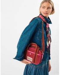 Accessorize - Cotton Patch Detail Top Handle Canvas Crossbody Bag - Lyst