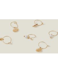 Accessorize - Women's Gold 3-pack Starburst Hoop Earrings - Lyst