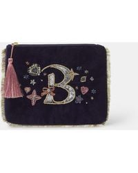 Accessorize - Embellished Initial Velvet Pouch - Lyst