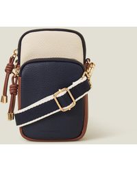 Accessorize - Pu Webbing Strap Zip Phone Bag, & Cream - Lyst