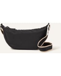 Accessorize - Women's Black Recycled Nylon Sling Cross-body Bag - Lyst