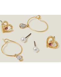 Accessorize - Women's Gold 3-pack Heart Stud And Hoops - Lyst