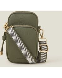 Accessorize - Women's Webbing Strap Phone Bag Green - Lyst