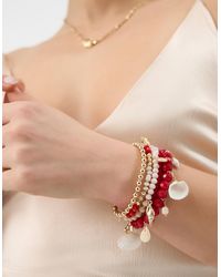 Accessorize - 4-Pack Chunky Beaded Charm Bracelets - Lyst