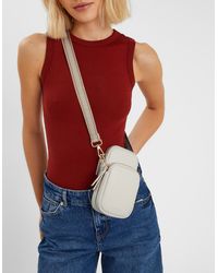 Accessorize - Leather Printed Webbing Strap Phone Bag - Lyst