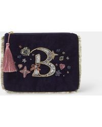 Accessorize - Embellished Initial Velvet Pouch - Lyst