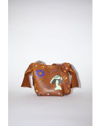 coach ocelot wristlet