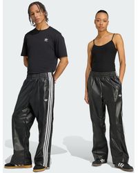 adidas - Pantalón X Jeremy Scott Pride Faux Leather Wide - Lyst